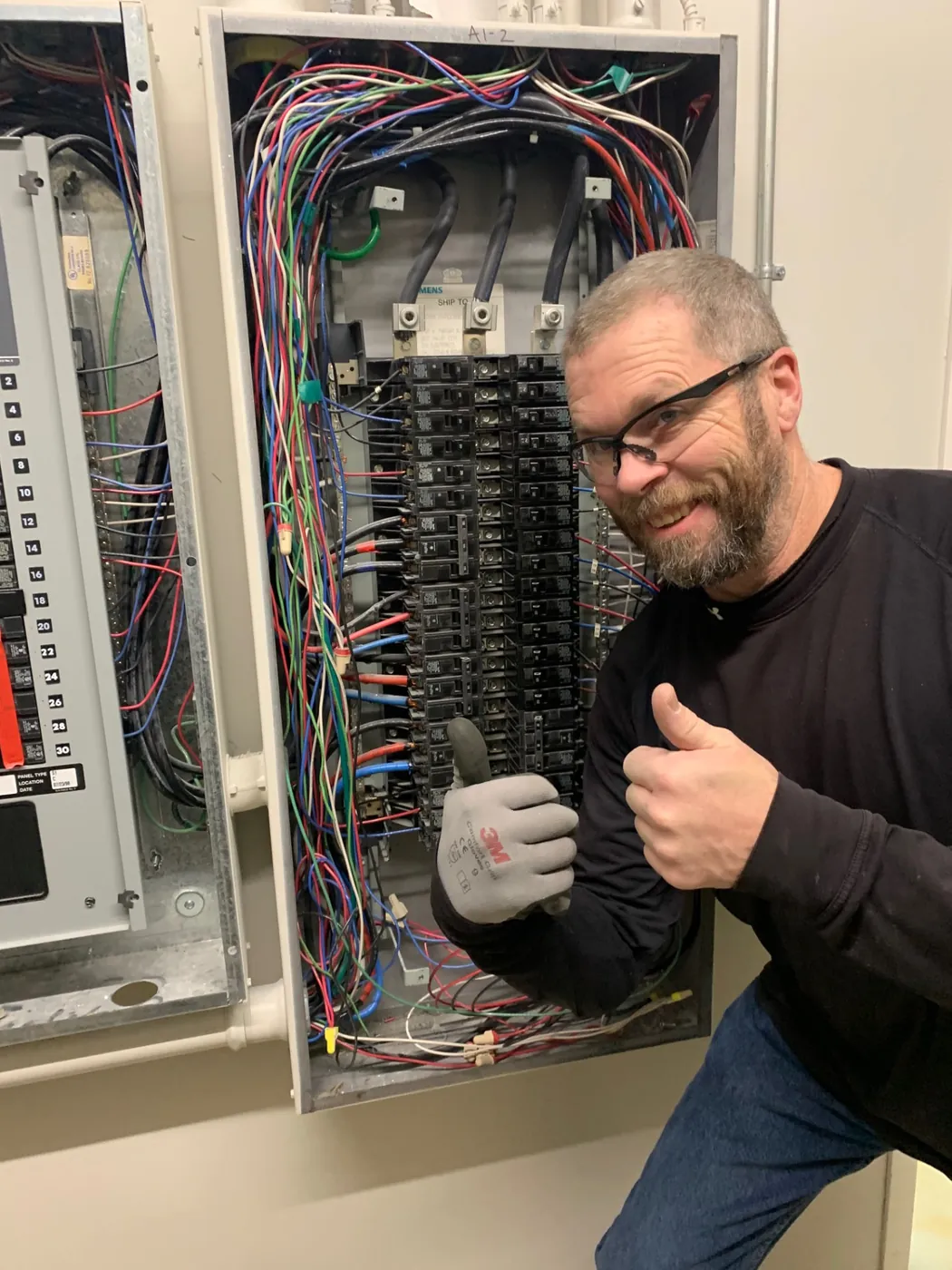 Licensed electrician replacing a residential electrical panel in Salt Lake City Licensed electrician replacing a residential electrical panel in Salt Lake City