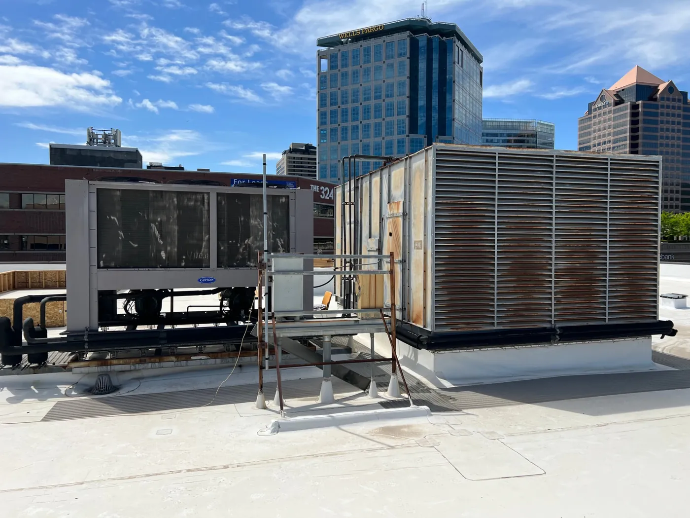 Rooftop mechanical equipment served by commercial electrical maintenance in downtown Salt Lake City Rooftop mechanical equipment served by commercial electrical maintenance in downtown Salt Lake City